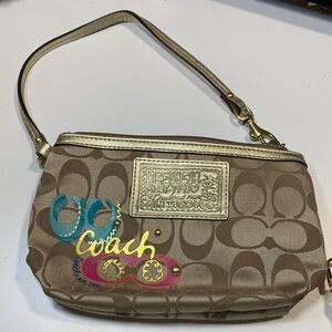 Coach Brown Wristlet with Gold and Pink Accents